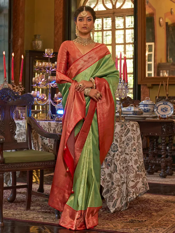 Light green silk saree with contrast border