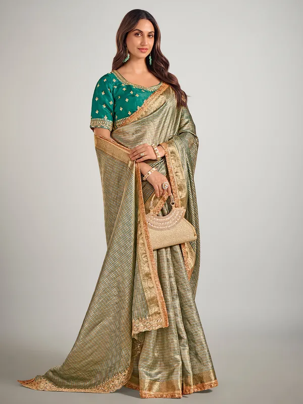Light green tisse silk zari weaving saree