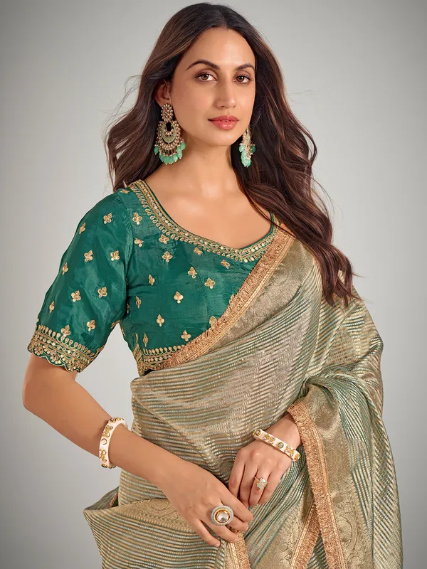 Light green tisse silk zari weaving saree