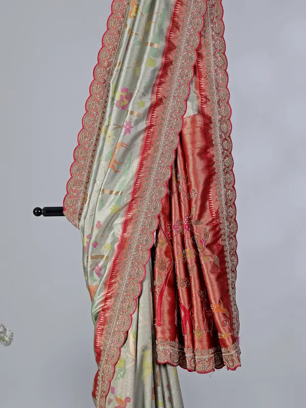 Light grey kanjivaram silk saree with colorful motifs