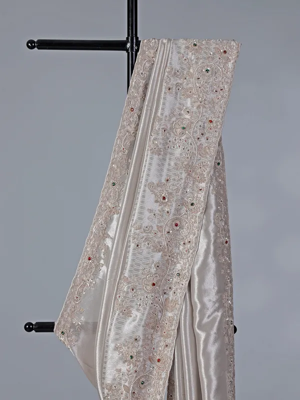 Light grey shimmer dola silk saree for wedding