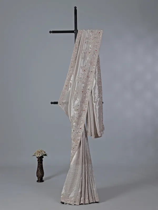 Light grey shimmer dola silk saree for wedding