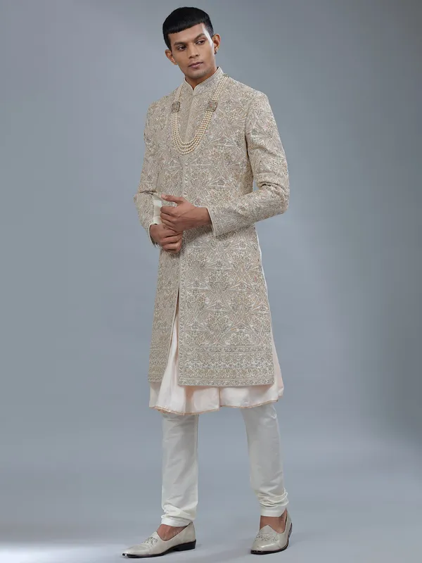 Light peach peshwai style raw silk sherwani