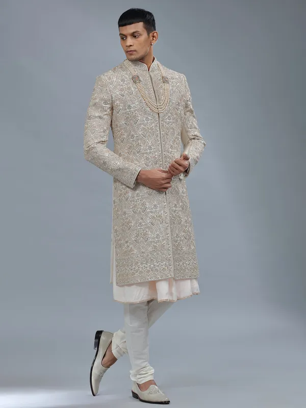 Light peach peshwai style raw silk sherwani