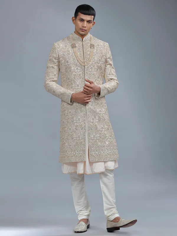 Light peach peshwai style raw silk sherwani