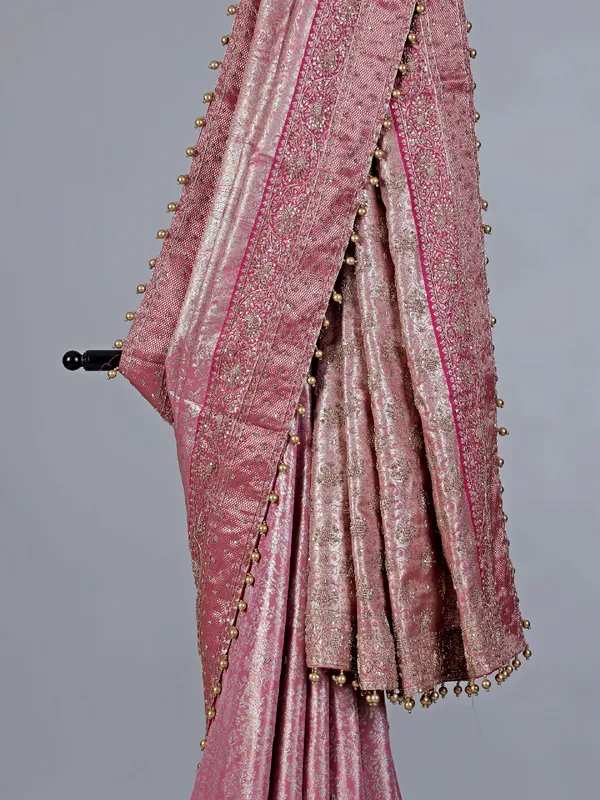 Light pink kanjivaram silk saree cutdana detailing
