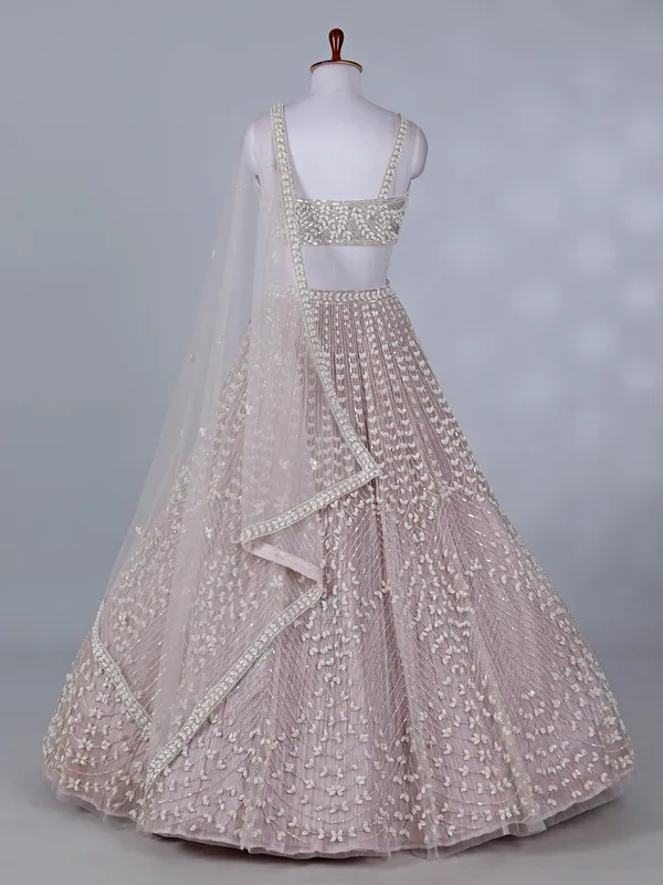 Light pink net lehenga choli for wedding celebration