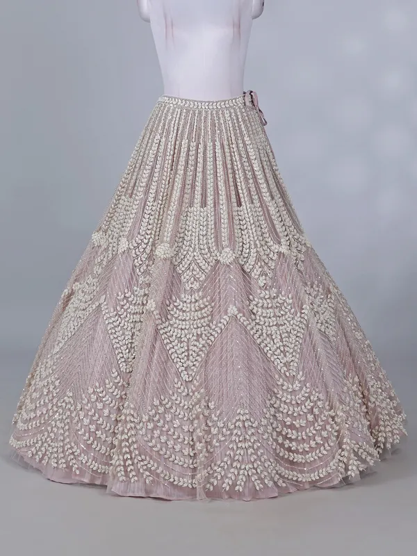Light pink net lehenga choli for wedding celebration