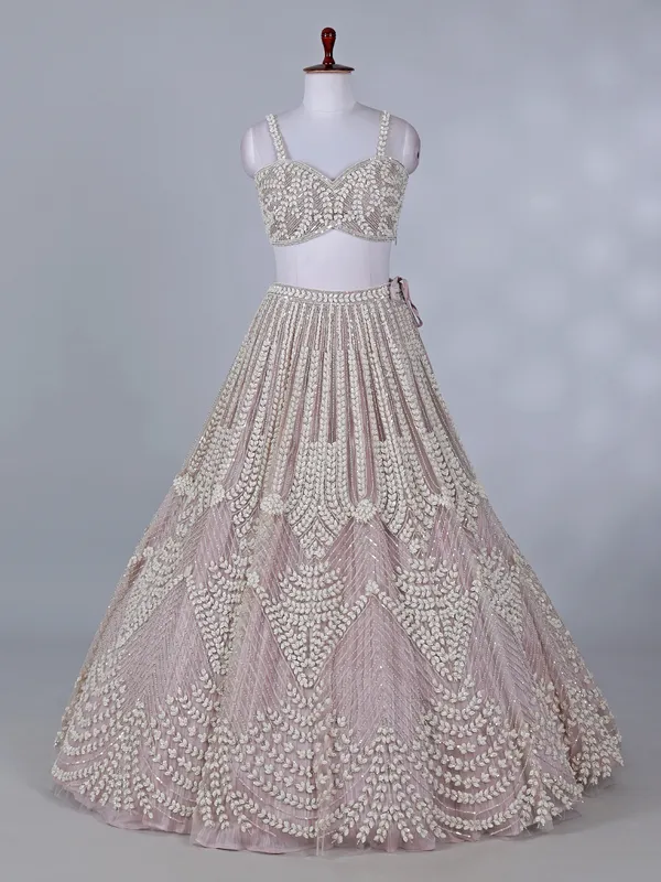 Light pink net lehenga choli for wedding celebration