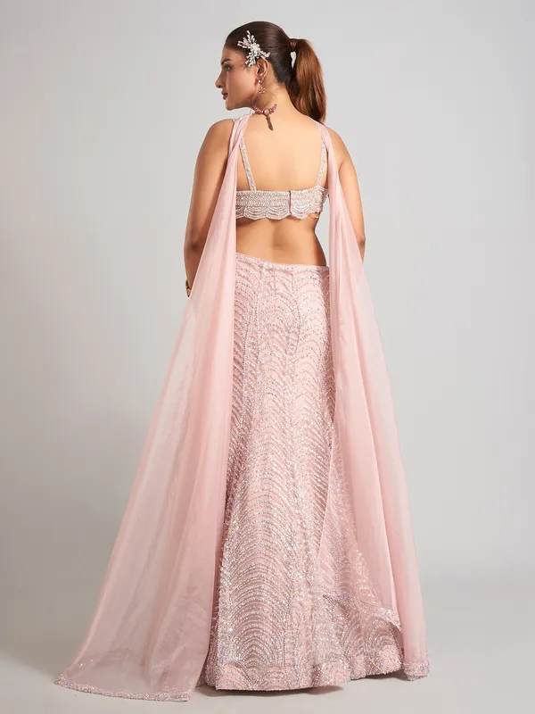 Light pink net sleeveless lehenga choli