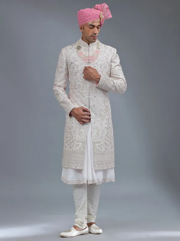 Light pink peshwai style raw silk sherwani