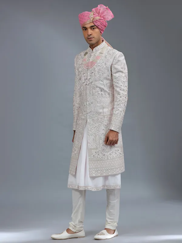 Light pink peshwai style raw silk sherwani