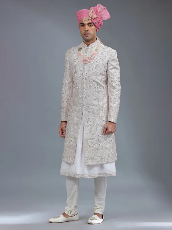 Light pink peshwai style raw silk sherwani