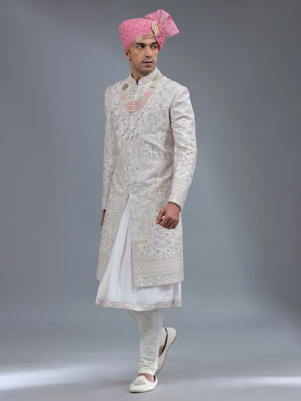 Light pink peshwai style raw silk sherwani