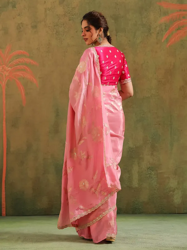 Light pink silk saree with red accents wedding wear