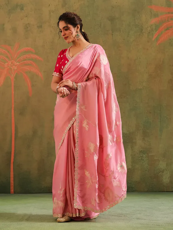 Light pink silk saree with red accents wedding wear