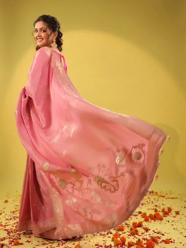 Light pink silk saree with zari embellishments for wedding wear