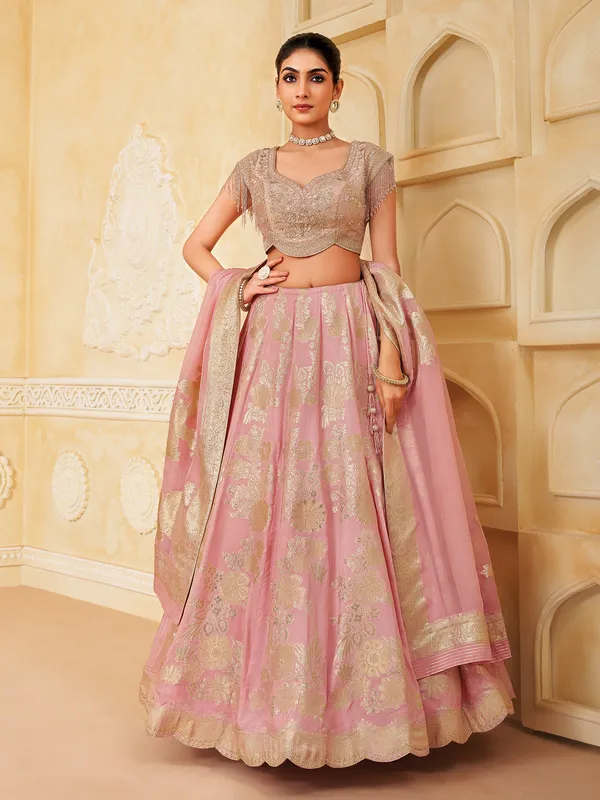 Light pink wedding wear silk lehenga choli with zari glow
