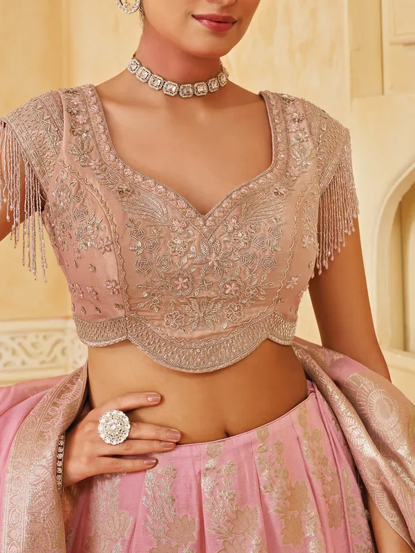 Light pink wedding wear silk lehenga choli with zari glow