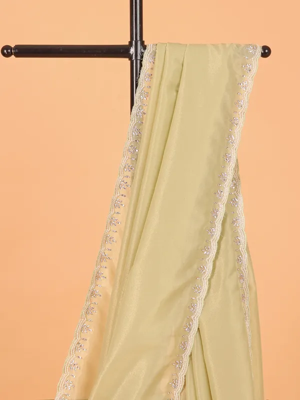 Light pista green organza saree for wedding wear