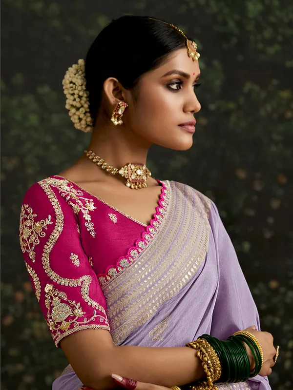 Light purple dola silk saree with contrast blouse