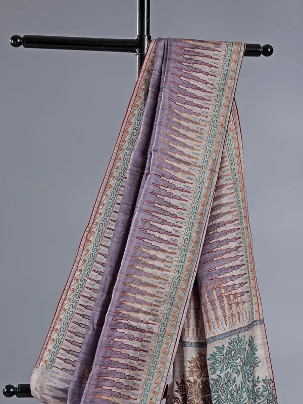 Light purple silk saree featuring traditional thread weaving
