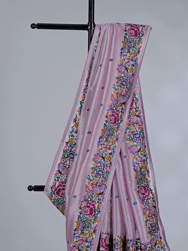 Light purple tissue saree with festive detailing