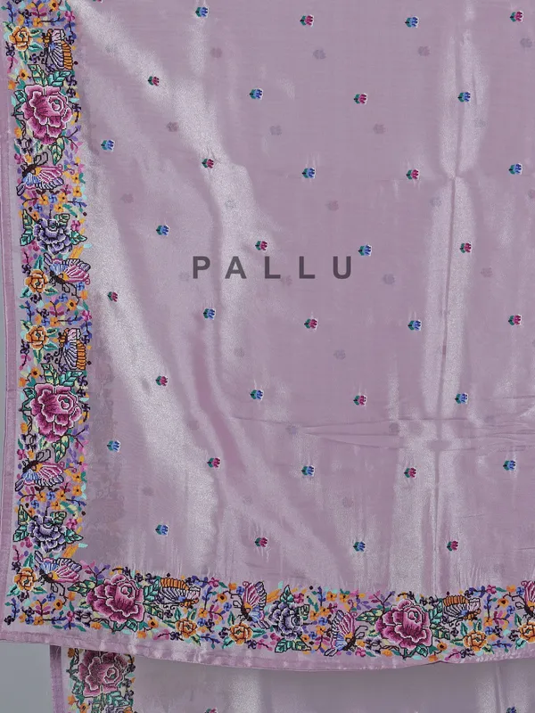 Light purple tissue saree with festive detailing