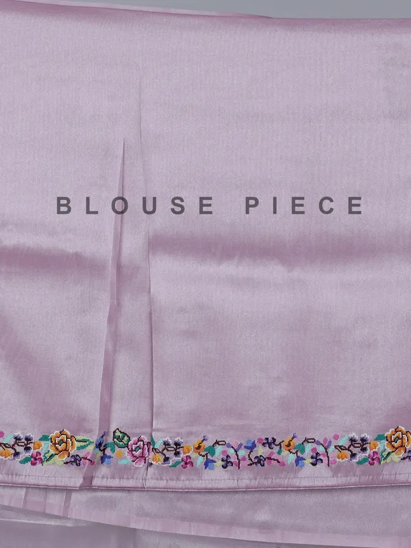 Light purple tissue saree with festive detailing