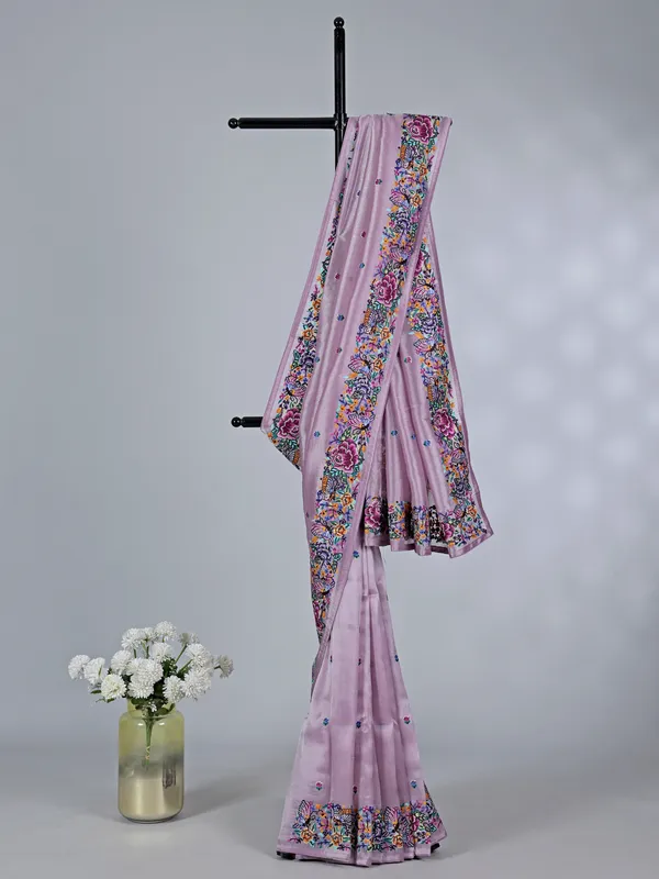 Light purple tissue saree with festive detailing