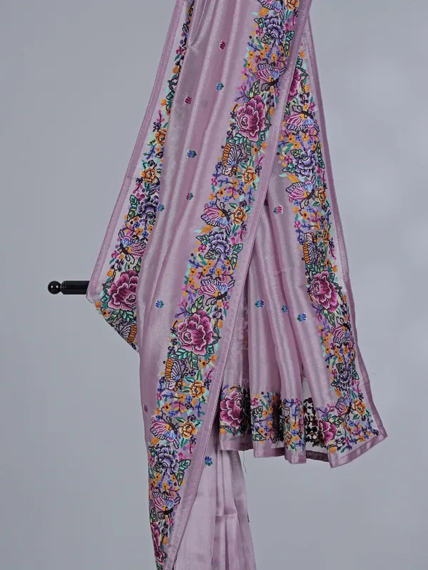 Light purple tissue saree with festive detailing