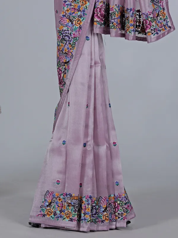Light purple tissue saree with festive detailing