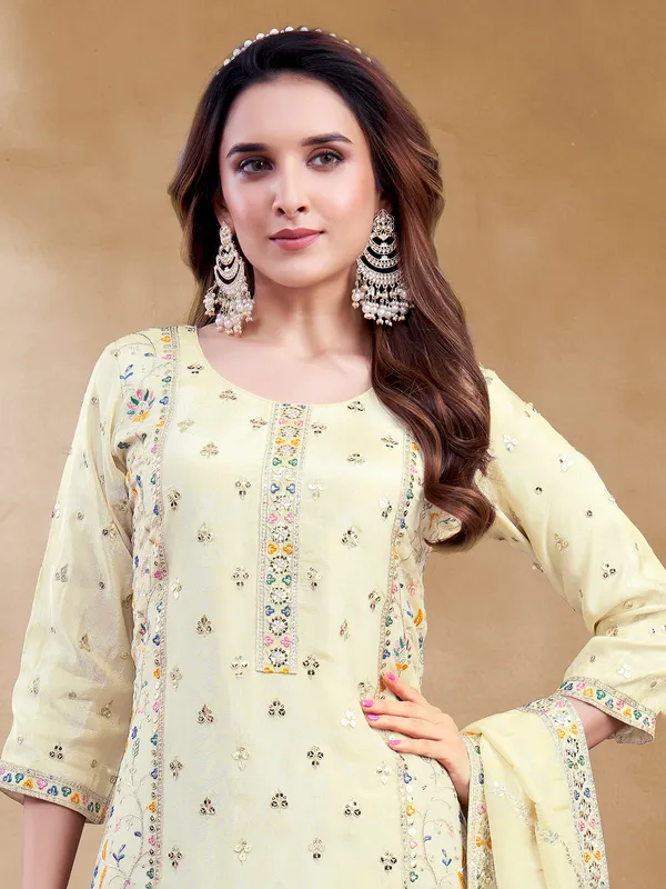 Light yellow silk salwar suit for festive