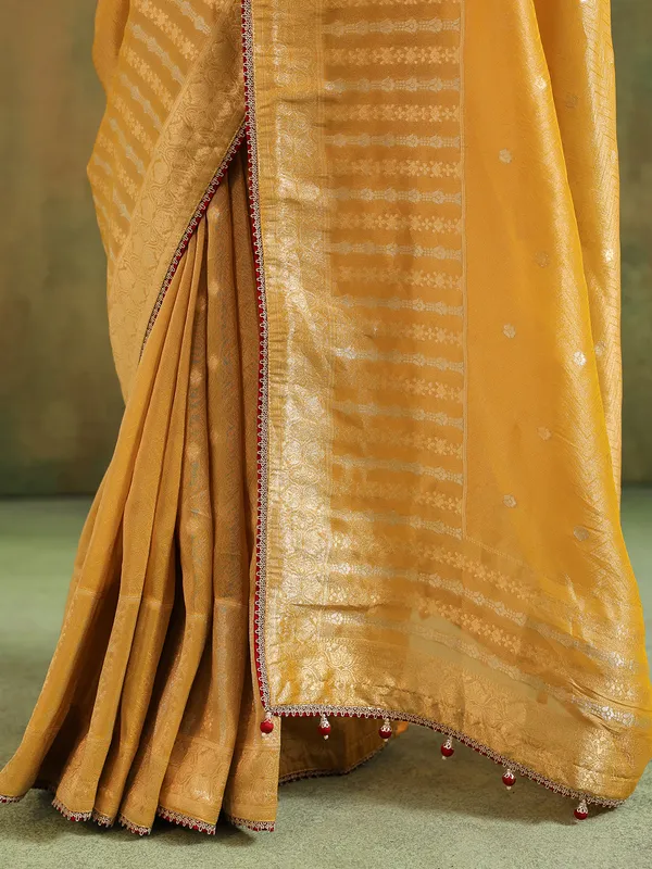 Light yellow silk saree with zari shine