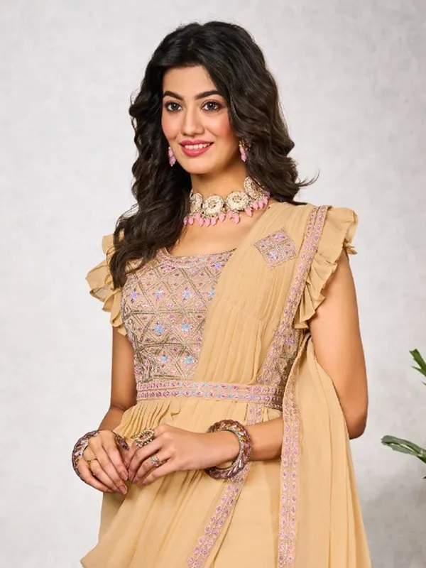 Light yellow wedding style shimmer georgette saree