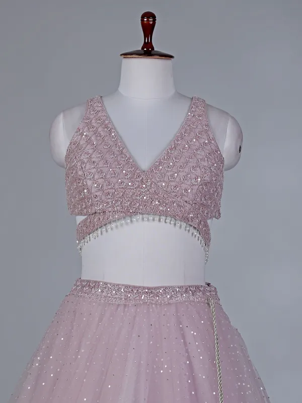 Lilac net lehenga choli with stone work