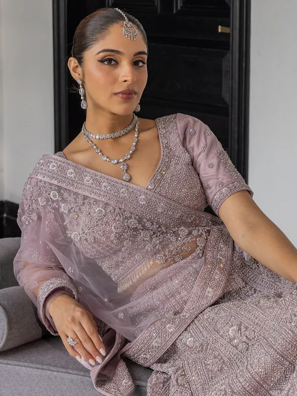 Lilac purple net lehenga choli with sequins work