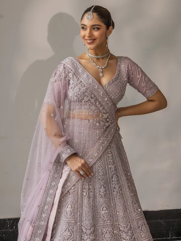 Lilac purple net lehenga choli with sequins work
