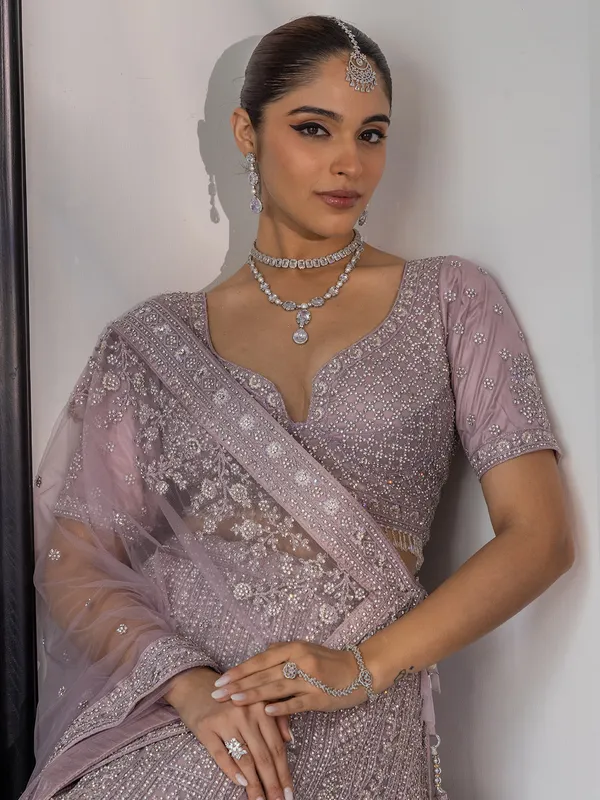 Lilac purple net lehenga choli with sequins work