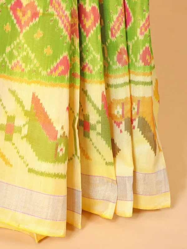 Lime green and yellow hue printed silk saree for festive