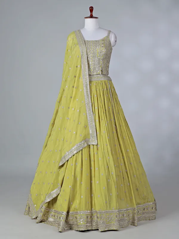 Lime green silk lehenga choli with mirror work
