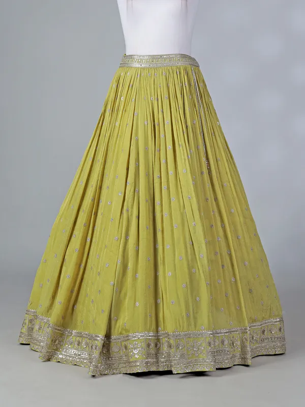 Lime green silk lehenga choli with mirror work