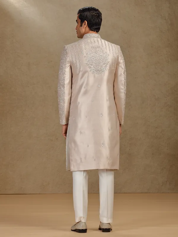 Luxurious cream silk sherwani with diamond highlights