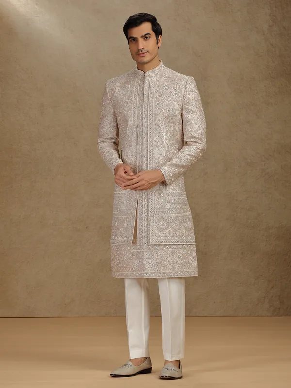 Luxurious cream silk sherwani with diamond highlights