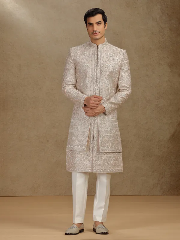 Luxurious cream silk sherwani with diamond highlights