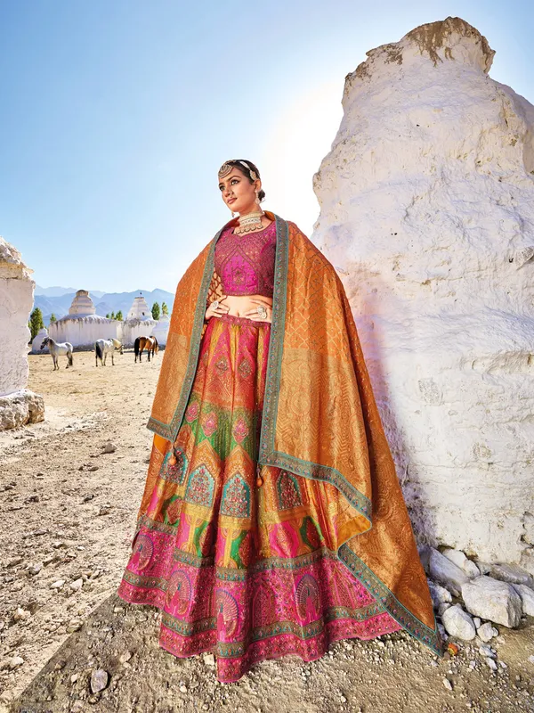 Magenta and green unstitched lehenga choli