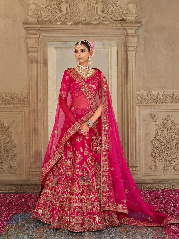 Magenta bridal silk lehenga choli with resham and sequins detailing