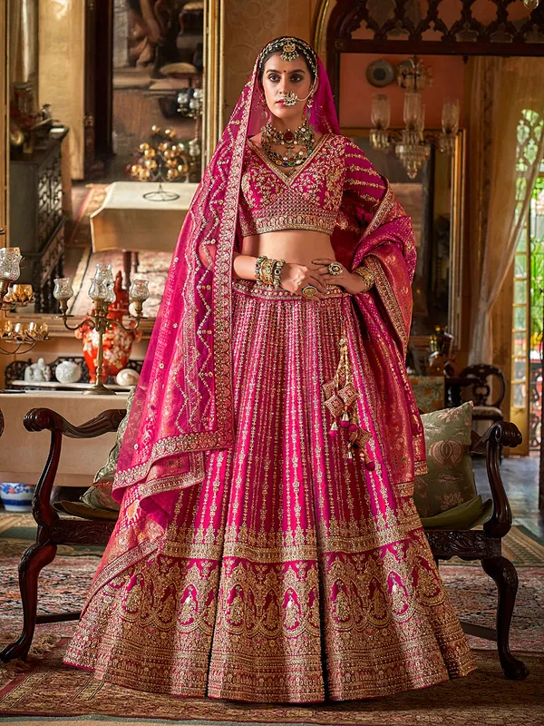 Magenta bridal silk lehenga choli with two dupatta
