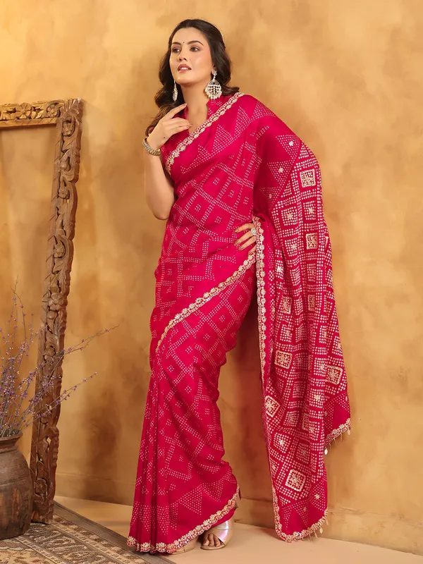 Magenta printed silk saree with resham detailing