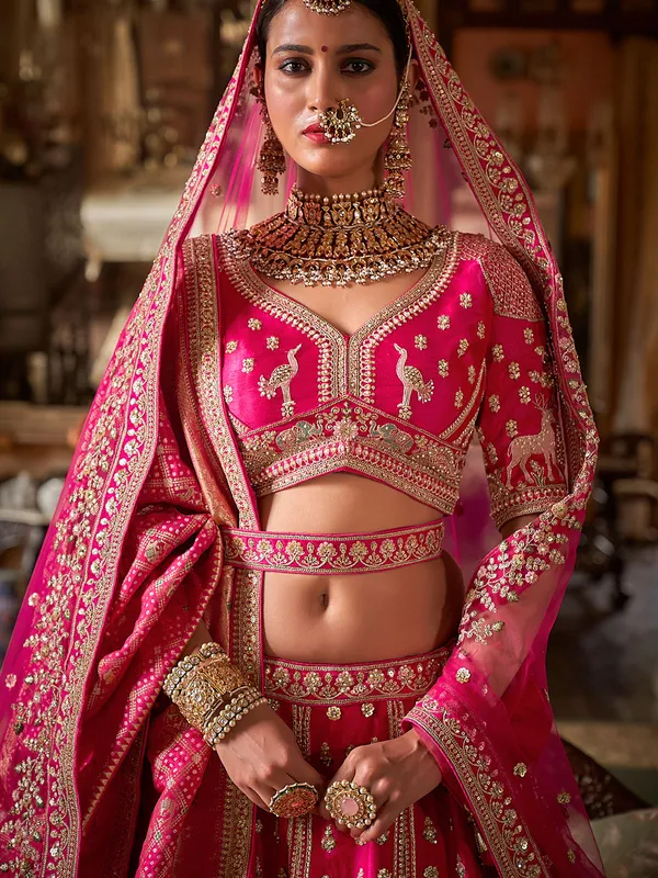 Magenta silk bridal lehenga choli with sequins glow